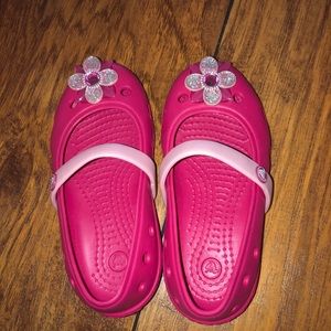 Pink sparkle flower Crocs size 9 (toddler)